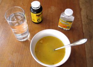 Photo of chicken soup and aspirin