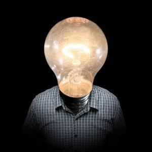 Person with a lightbulb for a head