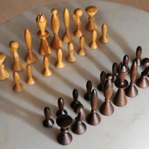 wood chess figures on table