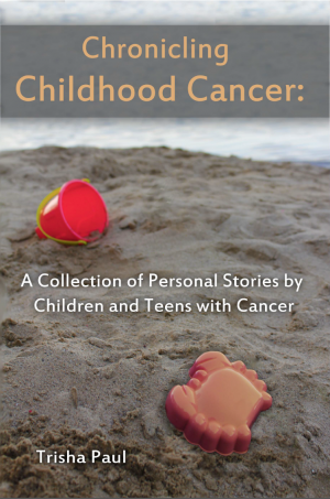 Book cover with sand bucket and toy crab on beach