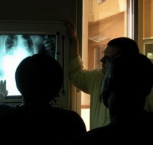 Image of doctor showing an x-ray